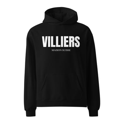 Damen Oversize Hoodie von VILLIERS MAISON SUISSE in Schwarz mit weissem Logo auf der Brust, frontal als Produktbild dargestellt.