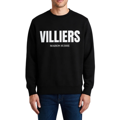 Herren Premium Sweatshirt von VILLIERS MAISON SUISSE in Schwarz mit weissem Logo auf der Brust, getragen von einem Model in Frontansicht